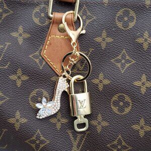 100% Auth Louis Vuitton Lock & Key with unbranded Bagcharm, Keycharm, Keychain